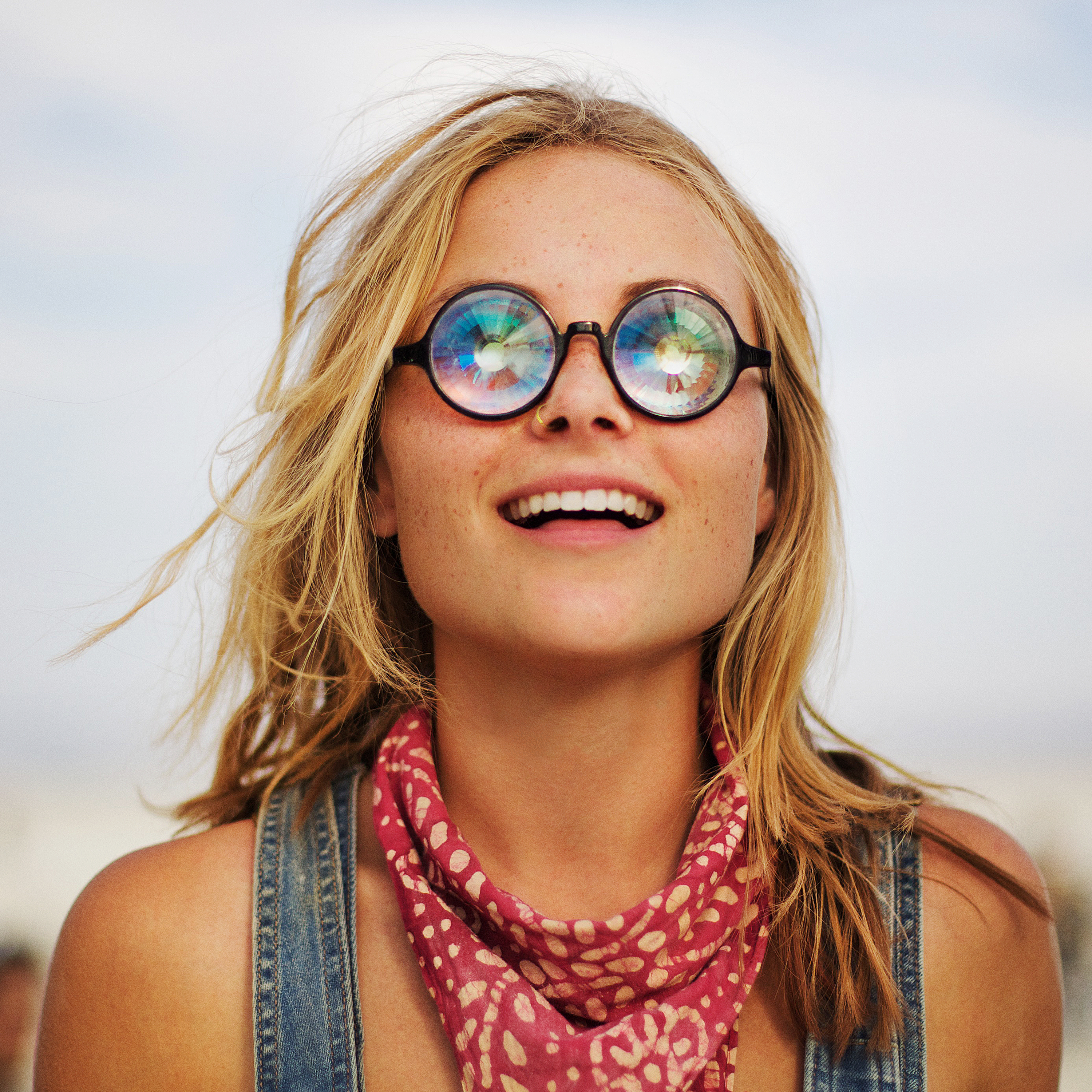 girl wearing psychedelic glasses